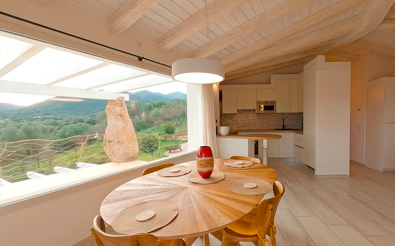 Open kitchen sharing the bright upper floor